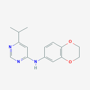 molecular formula C15H17N3O2 B7174266 N-(2,3-dihydro-1,4-benzodioxin-6-yl)-6-propan-2-ylpyrimidin-4-amine 