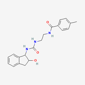 molecular formula C20H23N3O3 B7175344 N-[2-[(2-hydroxy-2,3-dihydro-1H-inden-1-yl)carbamoylamino]ethyl]-4-methylbenzamide 