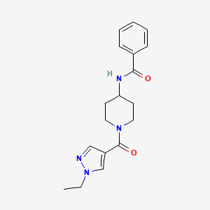 molecular formula C18H22N4O2 B7177282 N-[1-(1-ethylpyrazole-4-carbonyl)piperidin-4-yl]benzamide 