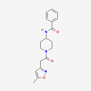 molecular formula C18H21N3O3 B7177301 N-[1-[2-(5-methyl-1,2-oxazol-3-yl)acetyl]piperidin-4-yl]benzamide 