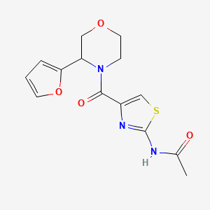 molecular formula C14H15N3O4S B7179137 N-[4-[3-(furan-2-yl)morpholine-4-carbonyl]-1,3-thiazol-2-yl]acetamide 