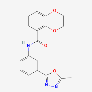 molecular formula C18H15N3O4 B7185002 N-[3-(5-methyl-1,3,4-oxadiazol-2-yl)phenyl]-2,3-dihydro-1,4-benzodioxine-5-carboxamide 