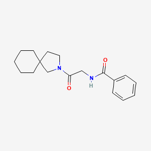 molecular formula C18H24N2O2 B7185540 N-[2-(2-azaspiro[4.5]decan-2-yl)-2-oxoethyl]benzamide 