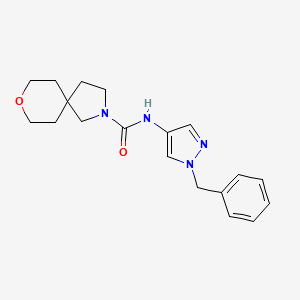 molecular formula C19H24N4O2 B7190345 N-(1-benzylpyrazol-4-yl)-8-oxa-2-azaspiro[4.5]decane-2-carboxamide 