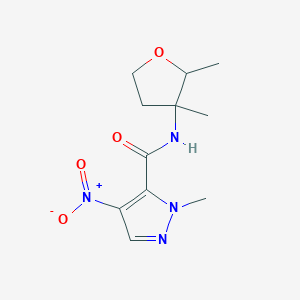 molecular formula C11H16N4O4 B7191800 N-(2,3-dimethyloxolan-3-yl)-2-methyl-4-nitropyrazole-3-carboxamide 