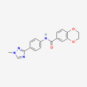 molecular formula C18H16N4O3 B7192091 N-[4-(1-methyl-1,2,4-triazol-3-yl)phenyl]-2,3-dihydro-1,4-benzodioxine-6-carboxamide 