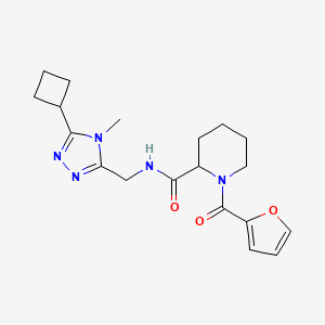 molecular formula C19H25N5O3 B7192220 N-[(5-cyclobutyl-4-methyl-1,2,4-triazol-3-yl)methyl]-1-(furan-2-carbonyl)piperidine-2-carboxamide 