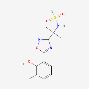 molecular formula C13H17N3O4S B7195882 N-[2-[5-(2-hydroxy-3-methylphenyl)-1,2,4-oxadiazol-3-yl]propan-2-yl]methanesulfonamide 