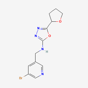 molecular formula C12H13BrN4O2 B7197378 N-[(5-bromopyridin-3-yl)methyl]-5-(oxolan-2-yl)-1,3,4-oxadiazol-2-amine 