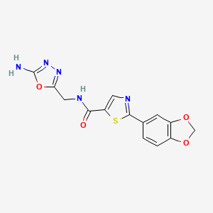 molecular formula C14H11N5O4S B7202488 N-[(5-amino-1,3,4-oxadiazol-2-yl)methyl]-2-(1,3-benzodioxol-5-yl)-1,3-thiazole-5-carboxamide 