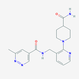 molecular formula C18H22N6O2 B7205847 N-[[2-(4-carbamoylpiperidin-1-yl)pyridin-3-yl]methyl]-6-methylpyridazine-4-carboxamide 