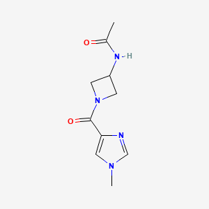 molecular formula C10H14N4O2 B7205951 N-[1-(1-methylimidazole-4-carbonyl)azetidin-3-yl]acetamide 