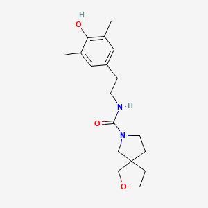 molecular formula C18H26N2O3 B7206131 N-[2-(4-hydroxy-3,5-dimethylphenyl)ethyl]-2-oxa-7-azaspiro[4.4]nonane-7-carboxamide 