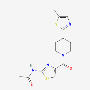 molecular formula C15H18N4O2S2 B7210355 N-[4-[4-(5-methyl-1,3-thiazol-2-yl)piperidine-1-carbonyl]-1,3-thiazol-2-yl]acetamide 
