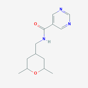 molecular formula C13H19N3O2 B7220439 N-[(2,6-dimethyloxan-4-yl)methyl]pyrimidine-5-carboxamide 