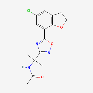 molecular formula C15H16ClN3O3 B7224795 N-[2-[5-(5-chloro-2,3-dihydro-1-benzofuran-7-yl)-1,2,4-oxadiazol-3-yl]propan-2-yl]acetamide 