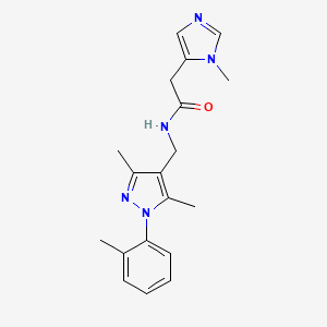 molecular formula C19H23N5O B7227583 N-[[3,5-dimethyl-1-(2-methylphenyl)pyrazol-4-yl]methyl]-2-(3-methylimidazol-4-yl)acetamide 