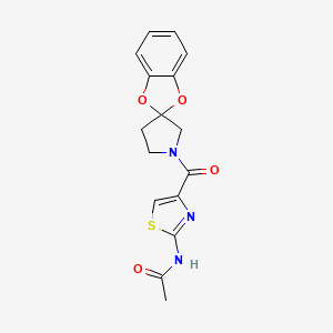 molecular formula C16H15N3O4S B7228648 N-[4-(spiro[1,3-benzodioxole-2,3'-pyrrolidine]-1'-carbonyl)-1,3-thiazol-2-yl]acetamide 