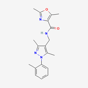 molecular formula C19H22N4O2 B7233399 N-[[3,5-dimethyl-1-(2-methylphenyl)pyrazol-4-yl]methyl]-2,5-dimethyl-1,3-oxazole-4-carboxamide 