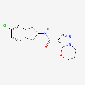 molecular formula C16H16ClN3O2 B7234450 N-(5-chloro-2,3-dihydro-1H-inden-2-yl)-6,7-dihydro-5H-pyrazolo[5,1-b][1,3]oxazine-3-carboxamide 