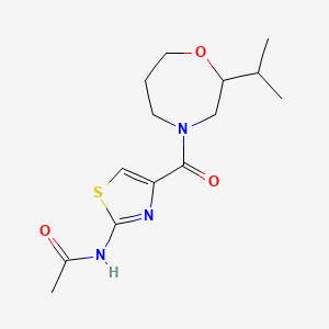 molecular formula C14H21N3O3S B7235443 N-[4-(2-propan-2-yl-1,4-oxazepane-4-carbonyl)-1,3-thiazol-2-yl]acetamide 