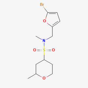 molecular formula C12H18BrNO4S B7237546 N-[(5-bromofuran-2-yl)methyl]-N,2-dimethyloxane-4-sulfonamide 