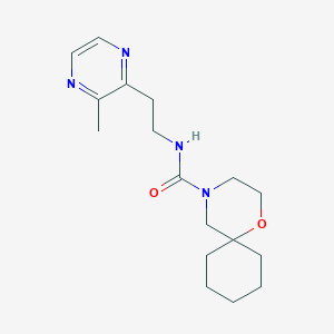 molecular formula C17H26N4O2 B7239363 N-[2-(3-methylpyrazin-2-yl)ethyl]-1-oxa-4-azaspiro[5.5]undecane-4-carboxamide 