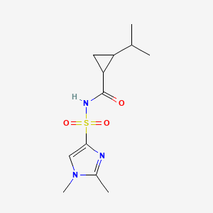 molecular formula C12H19N3O3S B7240819 N-(1,2-dimethylimidazol-4-yl)sulfonyl-2-propan-2-ylcyclopropane-1-carboxamide 