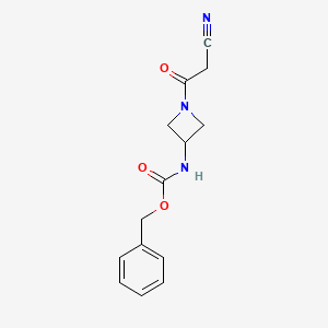 molecular formula C14H15N3O3 B7244316 benzyl N-[1-(2-cyanoacetyl)azetidin-3-yl]carbamate 