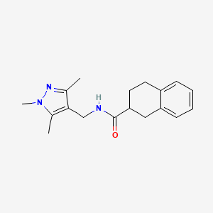 molecular formula C18H23N3O B7247209 N-[(1,3,5-trimethylpyrazol-4-yl)methyl]-1,2,3,4-tetrahydronaphthalene-2-carboxamide 
