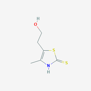 molecular formula C6H9NOS2 B072555 2-Mercapto-4-methyl-5-hydroxyethylthiazole CAS No. 1124-01-2