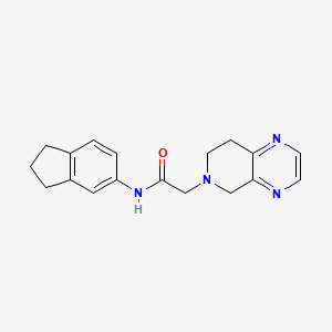 molecular formula C18H20N4O B7255676 N-(2,3-dihydro-1H-inden-5-yl)-2-(7,8-dihydro-5H-pyrido[3,4-b]pyrazin-6-yl)acetamide 