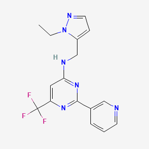 molecular formula C16H15F3N6 B7257240 N-[(2-ethylpyrazol-3-yl)methyl]-2-pyridin-3-yl-6-(trifluoromethyl)pyrimidin-4-amine 