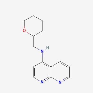 molecular formula C14H17N3O B7270534 N-(oxan-2-ylmethyl)-1,8-naphthyridin-4-amine 