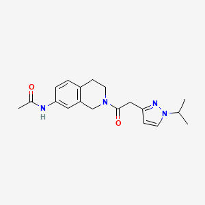 molecular formula C19H24N4O2 B7272143 N-[2-[2-(1-propan-2-ylpyrazol-3-yl)acetyl]-3,4-dihydro-1H-isoquinolin-7-yl]acetamide 