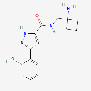 molecular formula C15H18N4O2 B7272203 N-[(1-aminocyclobutyl)methyl]-3-(2-hydroxyphenyl)-1H-pyrazole-5-carboxamide 