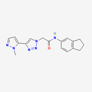 molecular formula C17H18N6O B7274349 N-(2,3-dihydro-1H-inden-5-yl)-2-[4-(2-methylpyrazol-3-yl)triazol-1-yl]acetamide 