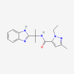 molecular formula C17H21N5O B7275021 N-[2-(1H-benzimidazol-2-yl)propan-2-yl]-2-ethyl-5-methylpyrazole-3-carboxamide 