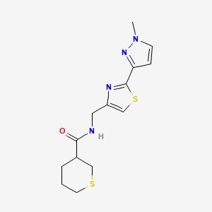 molecular formula C14H18N4OS2 B7275243 N-[[2-(1-methylpyrazol-3-yl)-1,3-thiazol-4-yl]methyl]thiane-3-carboxamide 