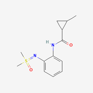 molecular formula C13H18N2O2S B7276155 N-[2-[[dimethyl(oxo)-lambda6-sulfanylidene]amino]phenyl]-2-methylcyclopropane-1-carboxamide 