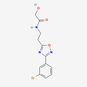 molecular formula C12H12BrN3O3 B7276802 N-[2-[3-(3-bromophenyl)-1,2,4-oxadiazol-5-yl]ethyl]-2-hydroxyacetamide 