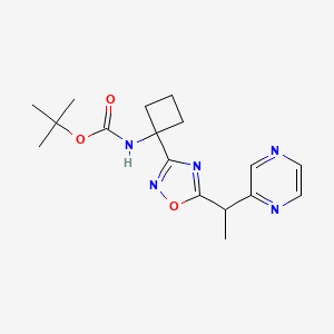 molecular formula C17H23N5O3 B7282069 tert-butyl N-[1-[5-(1-pyrazin-2-ylethyl)-1,2,4-oxadiazol-3-yl]cyclobutyl]carbamate 
