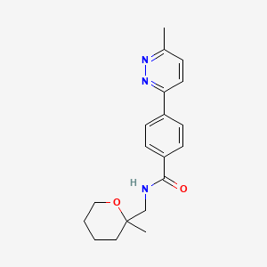 molecular formula C19H23N3O2 B7291490 N-[(2-methyloxan-2-yl)methyl]-4-(6-methylpyridazin-3-yl)benzamide 