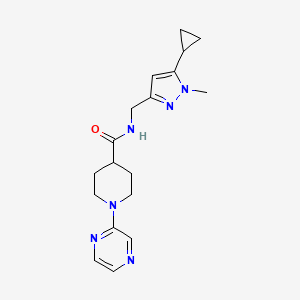 molecular formula C18H24N6O B7292496 N-[(5-cyclopropyl-1-methylpyrazol-3-yl)methyl]-1-pyrazin-2-ylpiperidine-4-carboxamide 