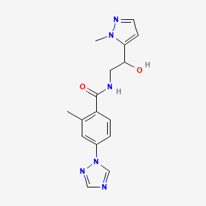 molecular formula C16H18N6O2 B7292792 N-[2-hydroxy-2-(2-methylpyrazol-3-yl)ethyl]-2-methyl-4-(1,2,4-triazol-1-yl)benzamide 