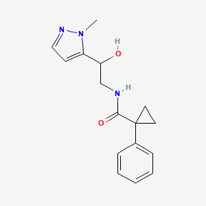 molecular formula C16H19N3O2 B7292828 N-[2-hydroxy-2-(2-methylpyrazol-3-yl)ethyl]-1-phenylcyclopropane-1-carboxamide 