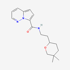 molecular formula C17H23N3O2 B7294425 N-[2-(5,5-dimethyloxan-2-yl)ethyl]pyrrolo[1,2-b]pyridazine-7-carboxamide 