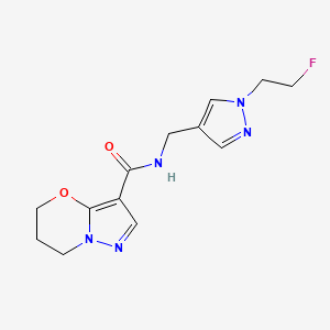 molecular formula C13H16FN5O2 B7295353 N-[[1-(2-fluoroethyl)pyrazol-4-yl]methyl]-6,7-dihydro-5H-pyrazolo[5,1-b][1,3]oxazine-3-carboxamide 