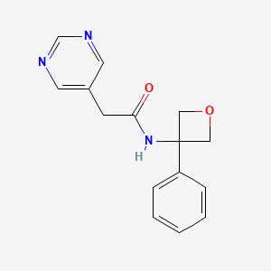 molecular formula C15H15N3O2 B7295617 N-(3-phenyloxetan-3-yl)-2-pyrimidin-5-ylacetamide 