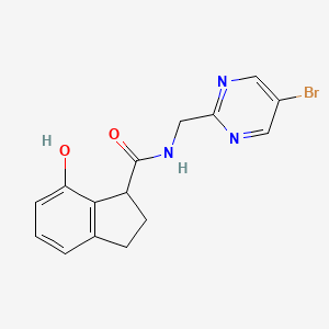 molecular formula C15H14BrN3O2 B7296354 N-[(5-bromopyrimidin-2-yl)methyl]-7-hydroxy-2,3-dihydro-1H-indene-1-carboxamide 